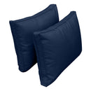 Pillow and bolster cushions displayed on an outdoor porch swing for a cozy, elegant setting.
