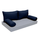 Elegant cushion and bolster set featuring refined craftsmanship and knife-edge detailing, designed for versatile indoor and outdoor comfort
