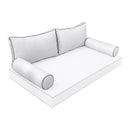Elegant cushion and bolster set featuring refined craftsmanship and knife-edge detailing, designed for versatile indoor and outdoor comfort.