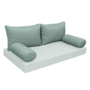 Elegant cushion and bolster set featuring refined craftsmanship and knife-edge detailing, designed for versatile indoor and outdoor comfort