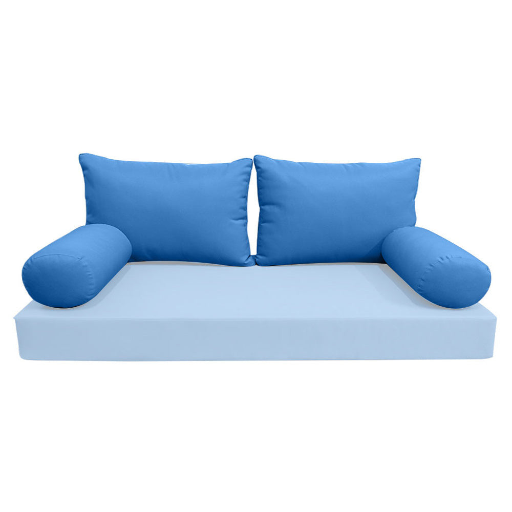 Elegant cushion and bolster set featuring refined craftsmanship and knife-edge detailing, designed for versatile indoor and outdoor comfort