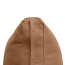 Indoor sunroom with pillow and bolster cushions, adding warmth and modern comfort