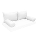 Elegant cushion and bolster set featuring refined craftsmanship and knife-edge detailing, designed for versatile indoor and outdoor comfort