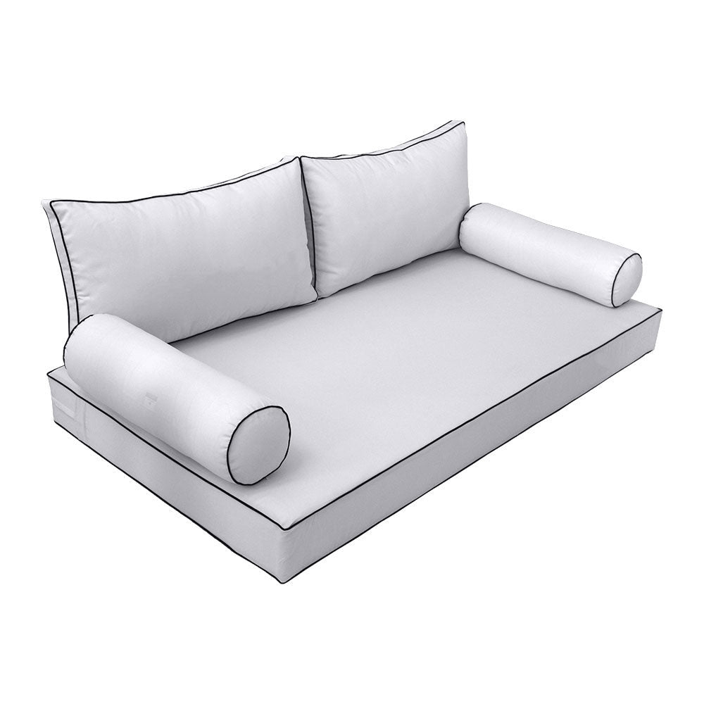 Elegant cushion and bolster set featuring refined craftsmanship and knife-edge detailing, designed for versatile indoor and outdoor comfort.