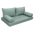 Elegant cushion and bolster set featuring refined craftsmanship and knife-edge detailing, designed for versatile indoor and outdoor comfort.
