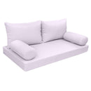 Elegant cushion and bolster set featuring refined craftsmanship and knife-edge detailing, designed for versatile indoor and outdoor comfort.