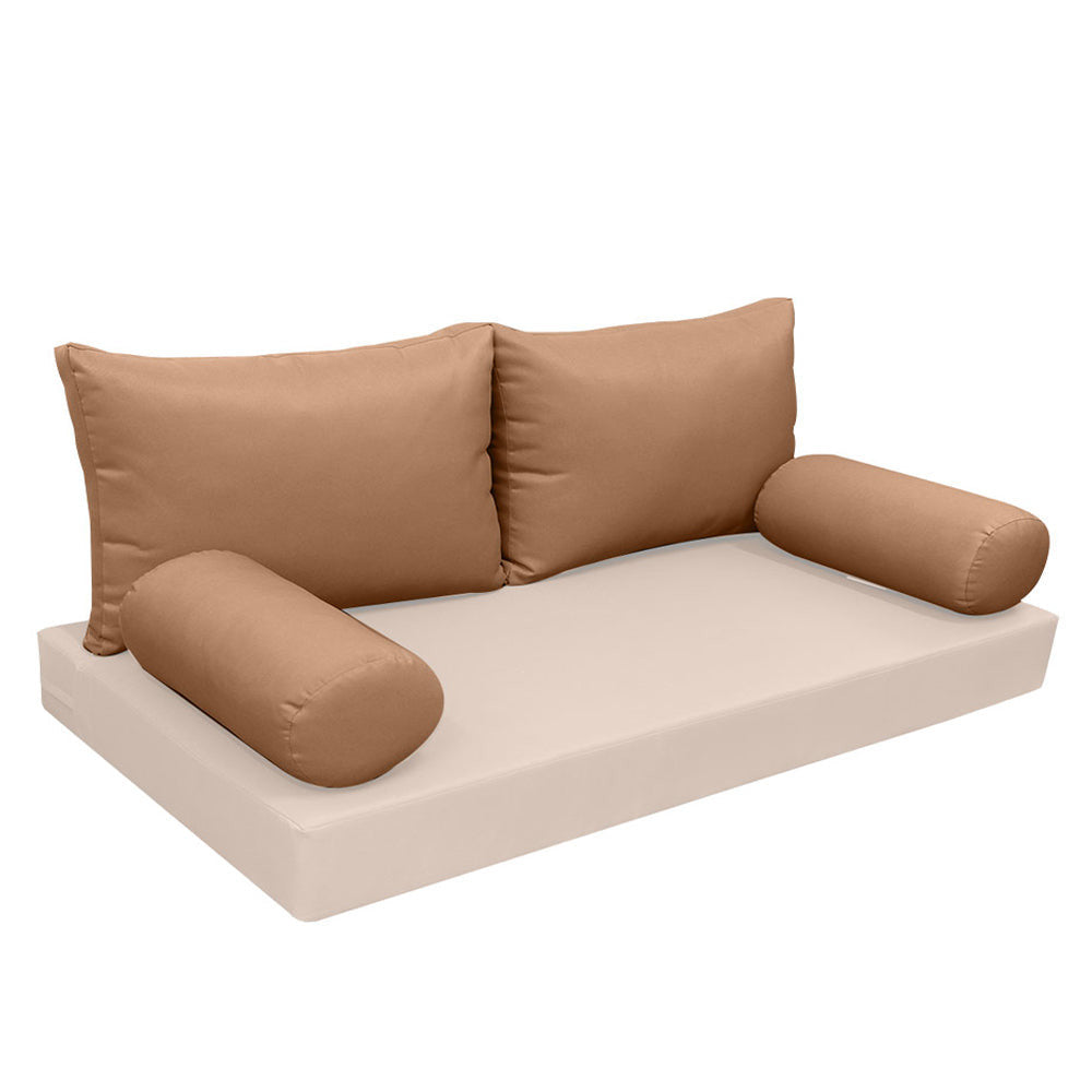 Elegant cushion and bolster set featuring refined craftsmanship and knife-edge detailing, designed for versatile indoor and outdoor comfort