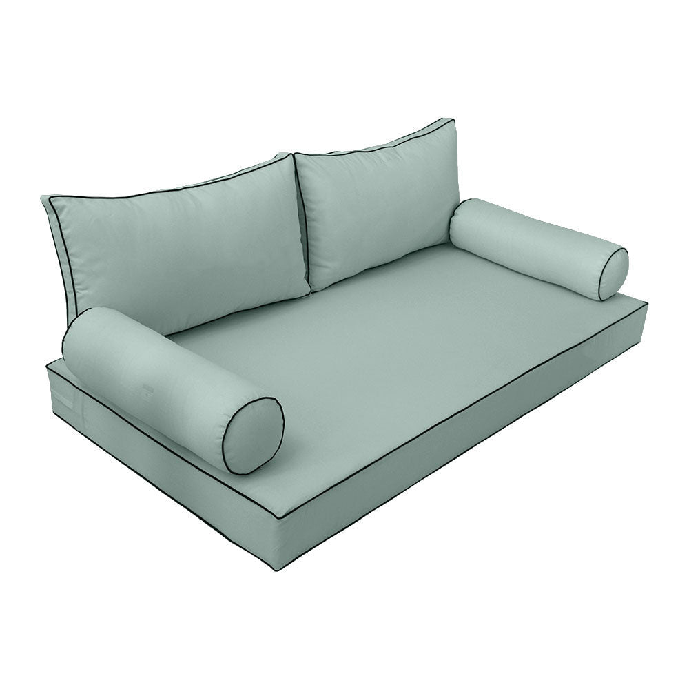 Elegant cushion and bolster set featuring refined craftsmanship and knife-edge detailing, designed for versatile indoor and outdoor comfort.