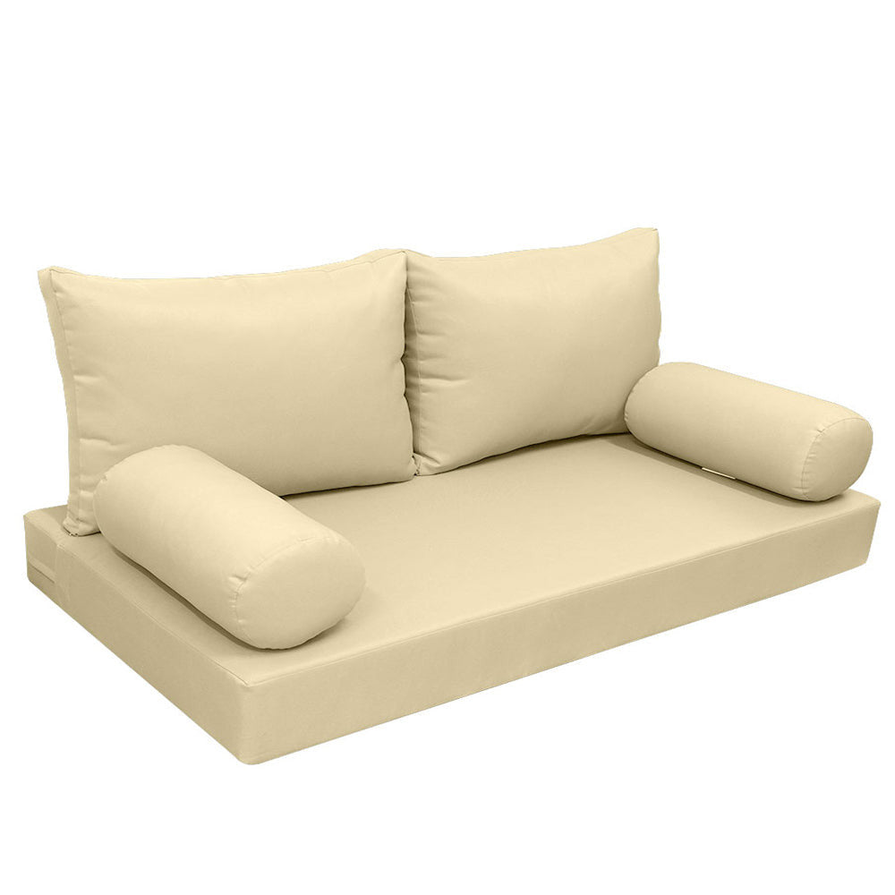 Elegant cushion and bolster set featuring refined craftsmanship and knife-edge detailing, designed for versatile indoor and outdoor comfor