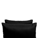 Pillow and bolster cushions displayed on an outdoor porch swing for a cozy, elegant setting
