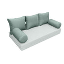 Elegant cushion and bolster set featuring refined craftsmanship and knife-edge detailing, designed for versatile indoor and outdoor comfort.
