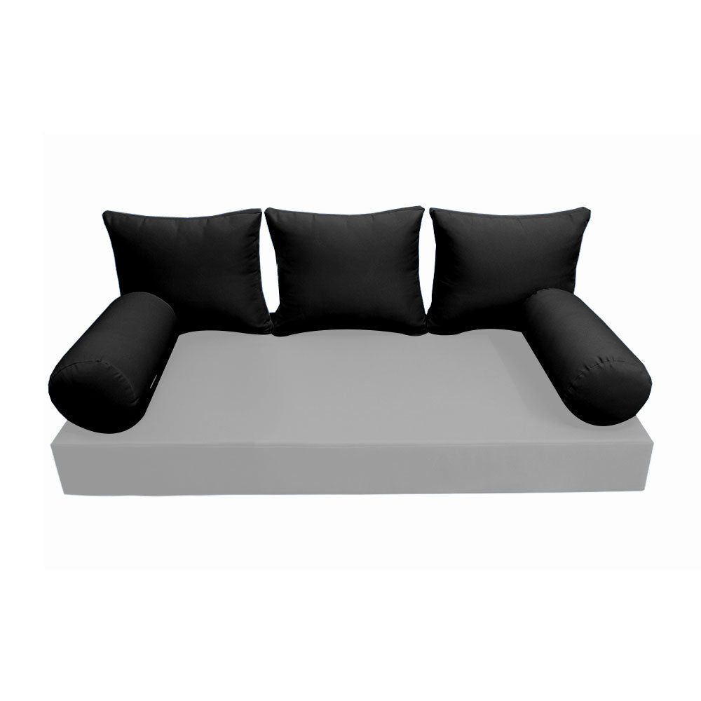 Elegant cushion and bolster set featuring refined craftsmanship and knife-edge detailing, designed for versatile indoor and outdoor comfort.