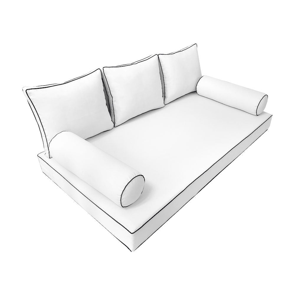 Elegant cushion and bolster set featuring refined craftsmanship and knife-edge detailing, designed for versatile indoor and outdoor comfort.