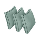 Outdoor daybed styled with cushion set, ideal for patio or garden lounging.