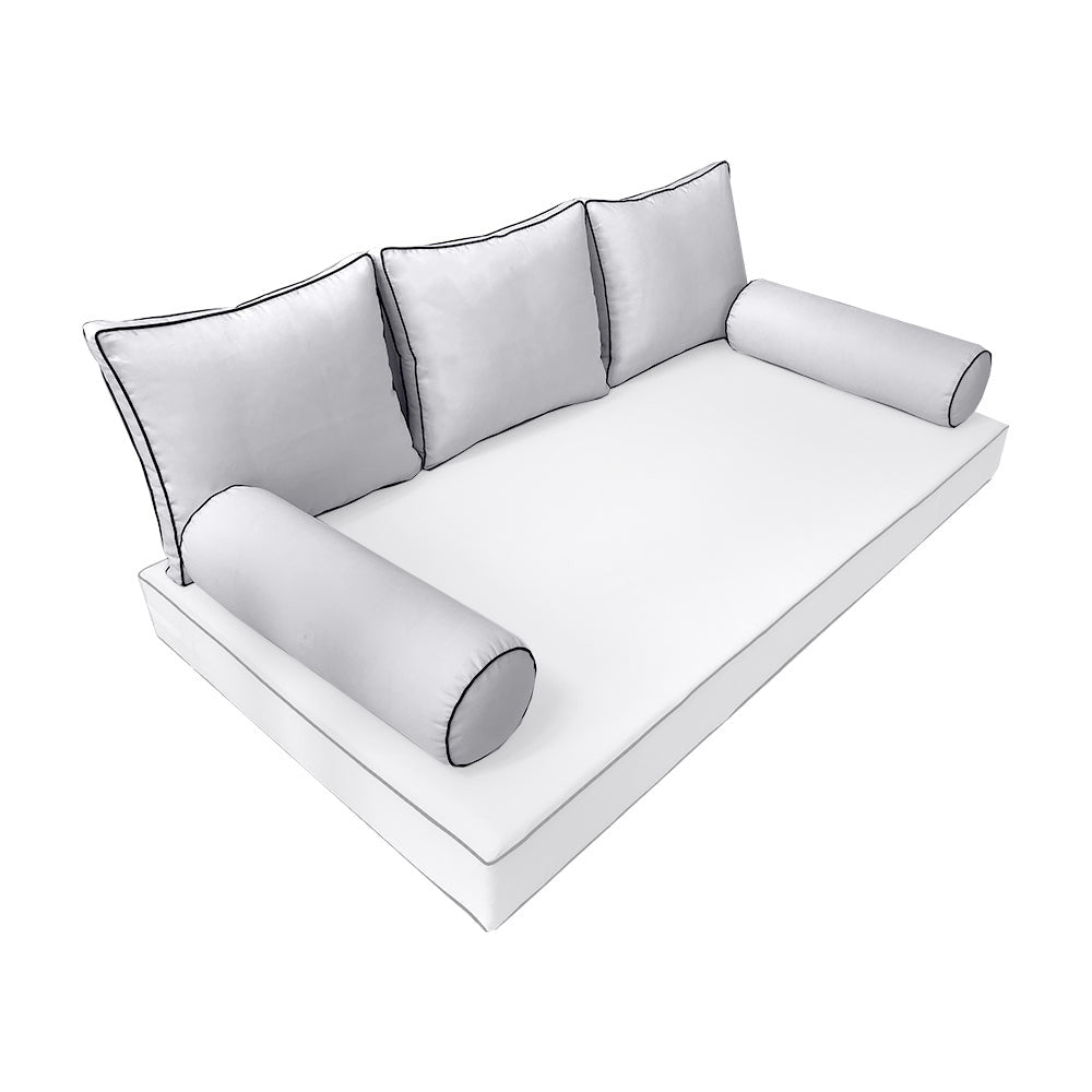 Elegant cushion and bolster set featuring refined craftsmanship and knife-edge detailing, designed for versatile indoor and outdoor comfort.