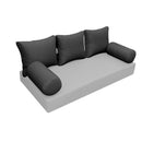 Elegant cushion and bolster set featuring refined craftsmanship and knife-edge detailing, designed for versatile indoor and outdoor comfort