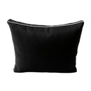 Pillow and bolster cushions displayed on an outdoor porch swing for a cozy, elegant setting.