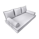Elegant cushion and bolster set featuring refined craftsmanship and knife-edge detailing, designed for versatile indoor and outdoor comfort.