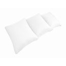 Pillow and bolster cushions displayed on an outdoor porch swing for a cozy, elegant setting