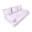 Elegant cushion and bolster set featuring refined craftsmanship and knife-edge detailing, designed for versatile indoor and outdoor comfort.