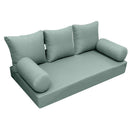 Elegant cushion and bolster set featuring refined craftsmanship and knife-edge detailing, designed for versatile indoor and outdoor comfort