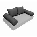 Elegant cushion and bolster set featuring refined craftsmanship and knife-edge detailing, designed for versatile indoor and outdoor comfort.