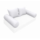 Elegant cushion and bolster set featuring refined craftsmanship and knife-edge detailing, designed for versatile indoor and outdoor comfort.
