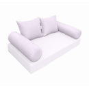 Elegant cushion and bolster set featuring refined craftsmanship and knife-edge detailing, designed for versatile indoor and outdoor comfort.