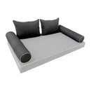 Elegant cushion and bolster set featuring refined craftsmanship and knife-edge detailing, designed for versatile indoor and outdoor comfort.
