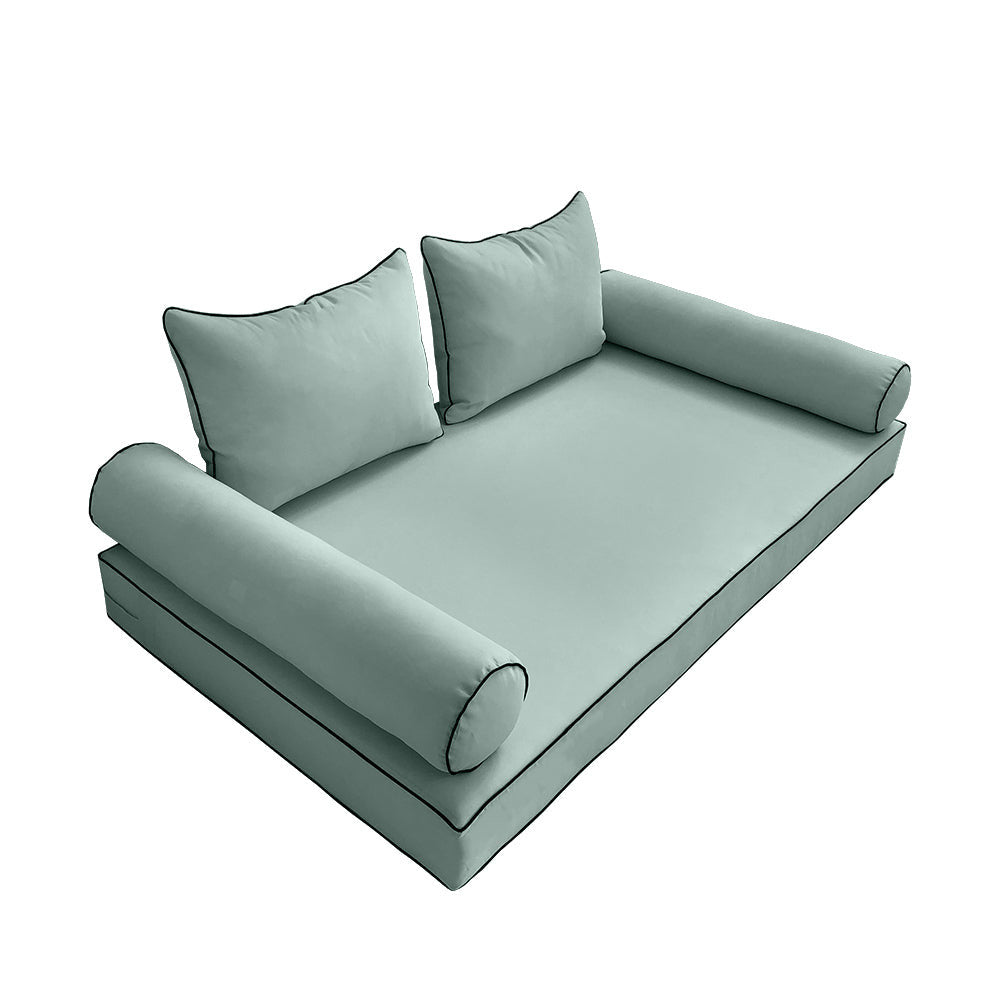 Elegant cushion and bolster set featuring refined craftsmanship and knife-edge detailing, designed for versatile indoor and outdoor comfort.