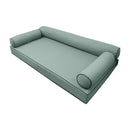 Elegant cushion and bolster set featuring refined craftsmanship and knife-edge detailing, designed for versatile indoor and outdoor comfort.