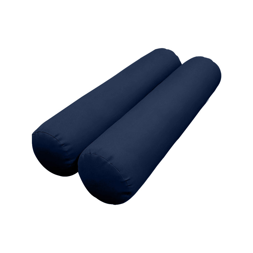 cushion and bolster set styled on a daybed with natural light background.