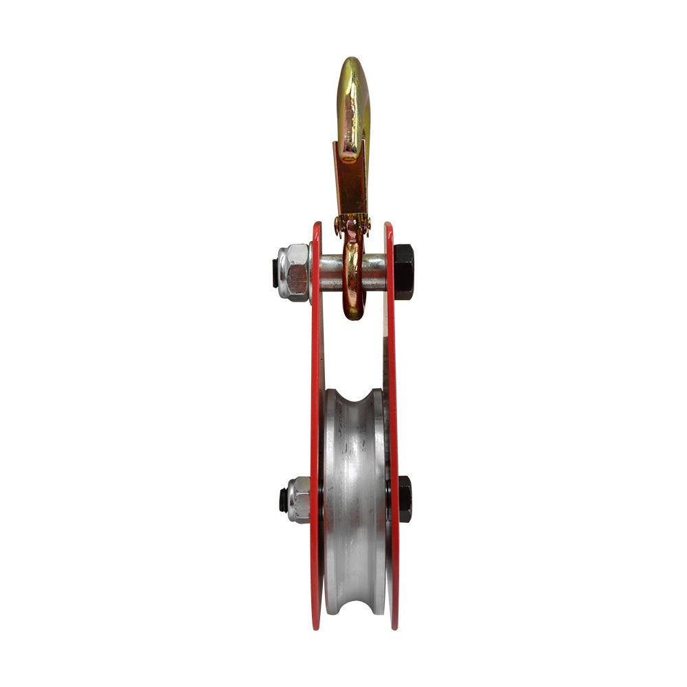 Industrial snatch block featuring red steel side plates and gold lifting hook.