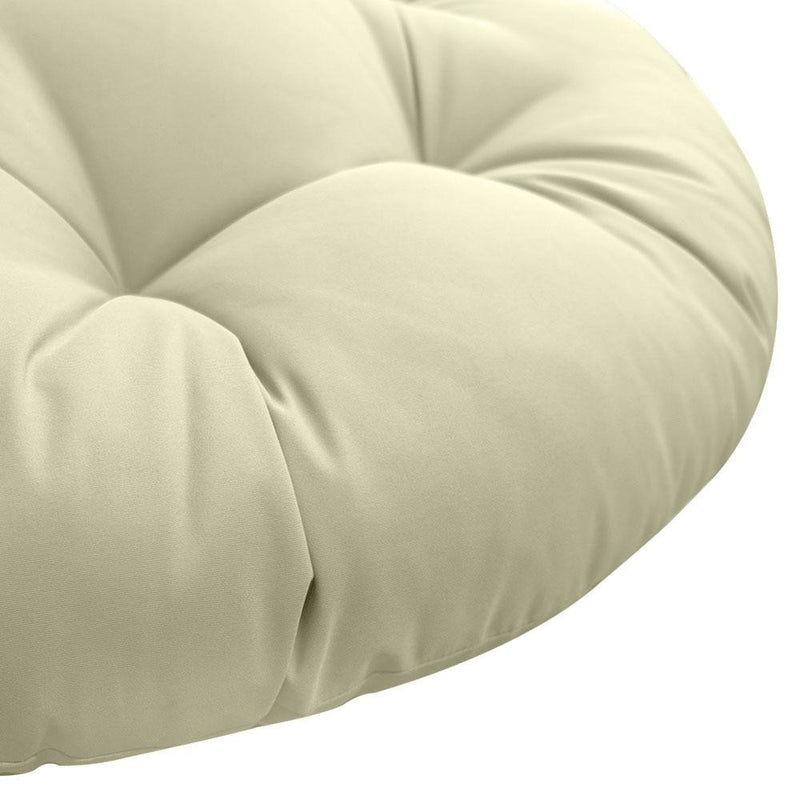Close-up of papasan cushion fabric and tufted stitching detail