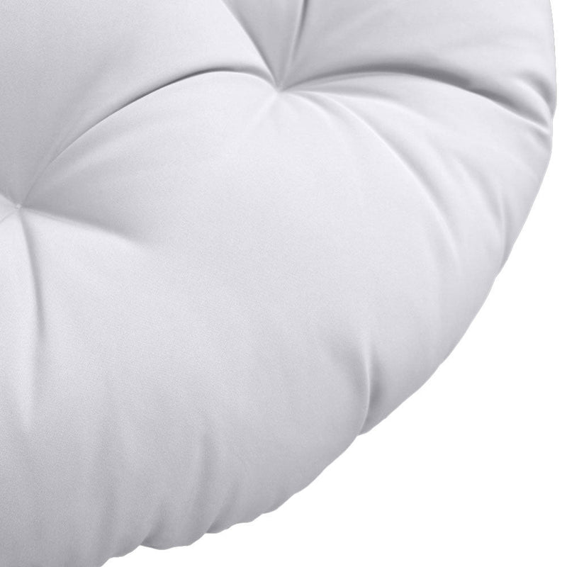Close-up of papasan cushion fabric and tufted stitching detail.
