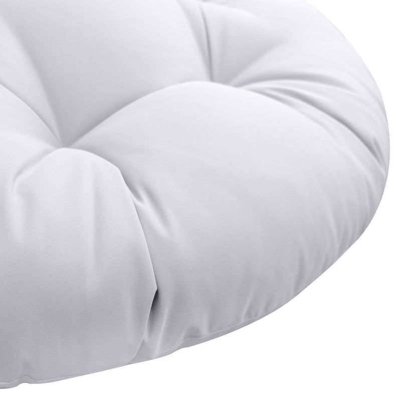 Close-up of papasan cushion fabric and tufted stitching detail