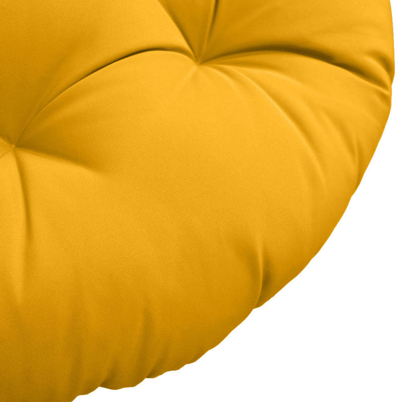 Close-up of papasan cushion fabric and tufted stitching detail.