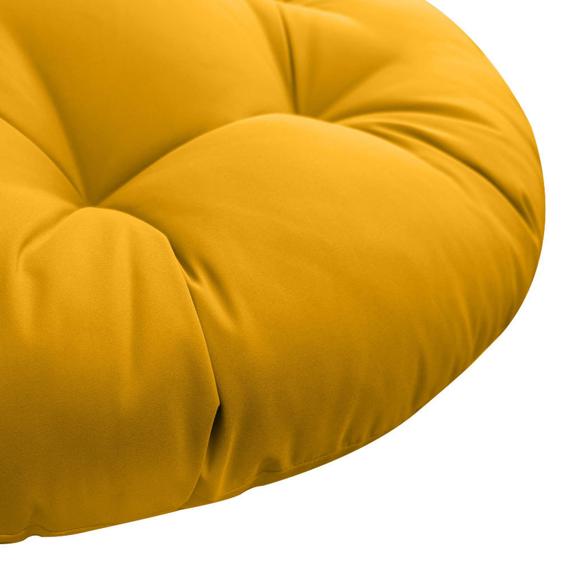 Close-up of papasan cushion fabric and tufted stitching detail.
