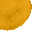 Close-up of papasan cushion fabric and tufted stitching detail.