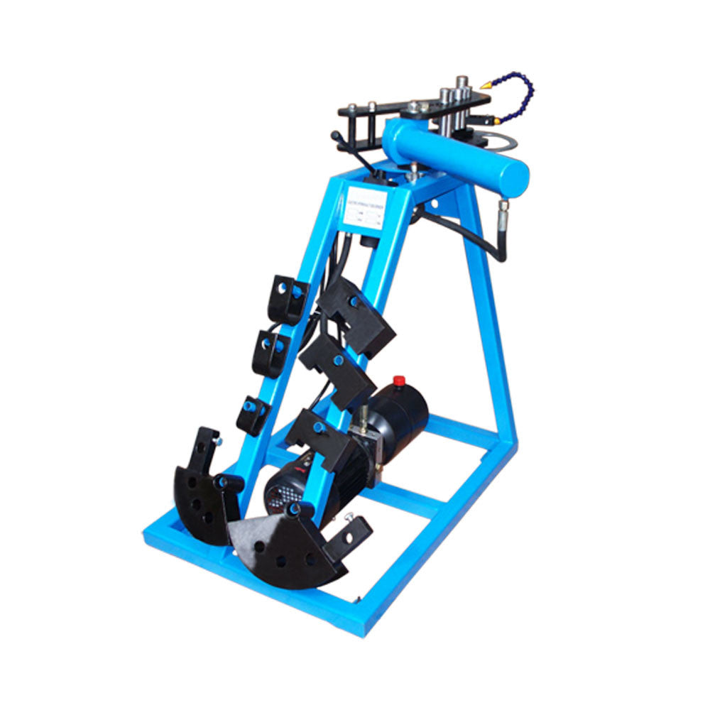 Workshop pipe bending machine with hydraulic ram and electric power system.