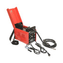 Compact MIG welding machine set laid out with welding shield and tools