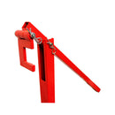 Close-up of red fence post puller tool with hinge and pin assembly for post removal.