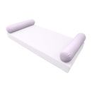 Elegant cushion and bolster set featuring refined craftsmanship and knife-edge detailing, designed for versatile indoor and outdoor comfort.