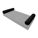 Elegant cushion and bolster set featuring refined craftsmanship and knife-edge detailing, designed for versatile indoor and outdoor comfort.