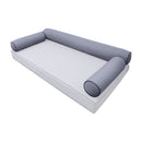 Elegant cushion and bolster set featuring refined craftsmanship and knife-edge detailing, designed for versatile indoor and outdoor comfort.