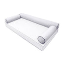Elegant cushion and bolster set featuring refined craftsmanship and knife-edge detailing, designed for versatile indoor and outdoor comfort.