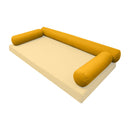 Elegant cushion and bolster set featuring refined craftsmanship and knife-edge detailing, designed for versatile indoor and outdoor comfort.