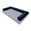 Elegant cushion and bolster set featuring refined craftsmanship and knife-edge detailing, designed for versatile indoor and outdoor comfort.