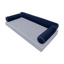 Elegant cushion and bolster set featuring refined craftsmanship and knife-edge detailing, designed for versatile indoor and outdoor comfort.