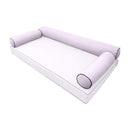 Elegant cushion and bolster set featuring refined craftsmanship and knife-edge detailing, designed for versatile indoor and outdoor comfort.
